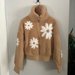 Cozy Tan Fleece Jacket with White Daisy Detailings